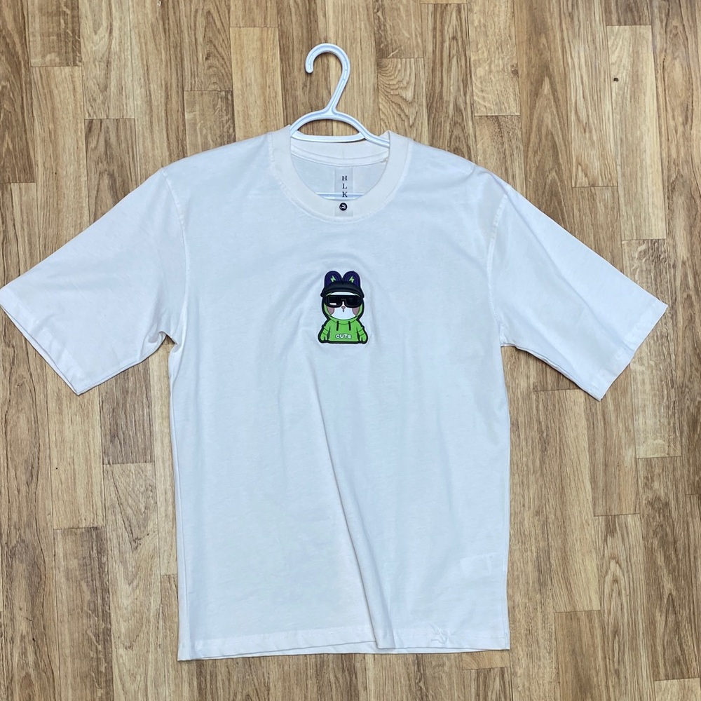 White T-Shirt with Cartoon Graphic
